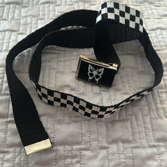 Checkered Black and White Belt with Butterfly on Buckle
NWOT - Picture 4 of 8